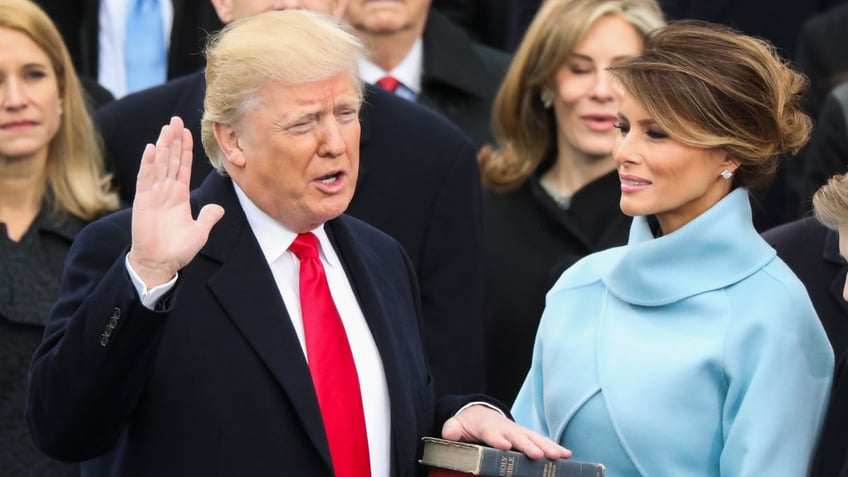 Donald Trump is sworn in as the 45th president of the United States as Melania Trump looks on during the 58th Presidential Inauguration at the U.S. Capitol in Washington, Friday, Jan. 20, 2017. (AP Photo/Andrew Harnik)