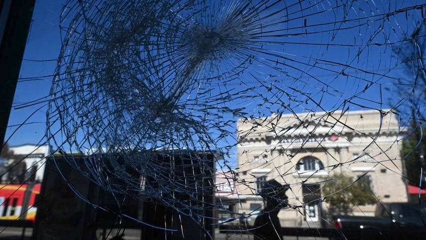 A bullet shatters glass