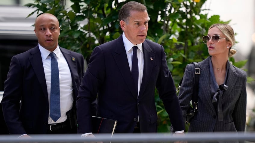 Hunter Biden and his wife, Melissa Cohen Biden, arrives at federal court