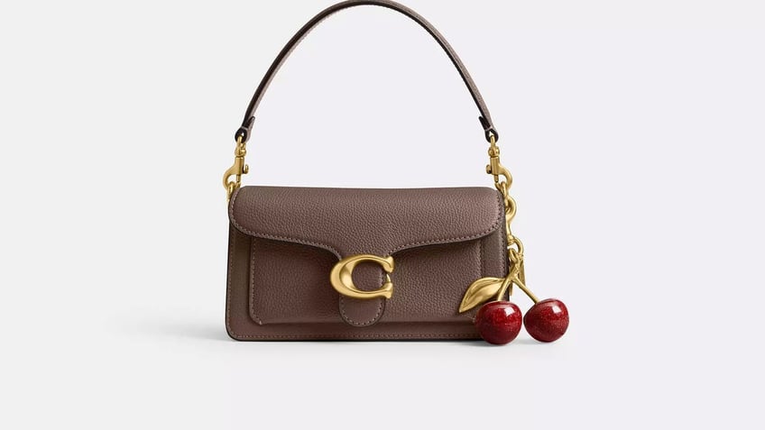 Charms are big and a fun way to wear bags in the fall.