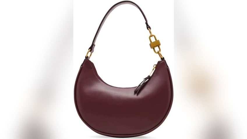 Try a crescent-shaped bag in dark cherry.