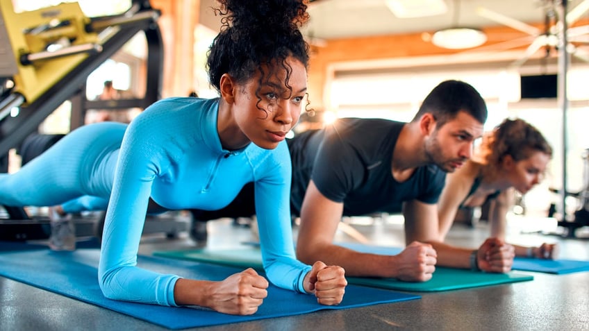 People exercising at gym