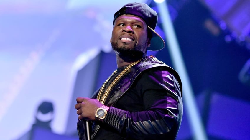 50 cent throws microphone into audience allegedly injuring concertgoer