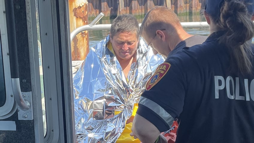 63 year old new yorker treads water for 5 hours creates makeshift flag before ocean rescue