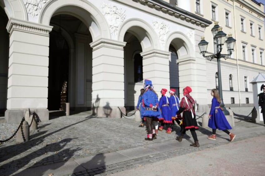 7 activists in norway meet with the king to discuss a wind farm that is on land used by sami herders