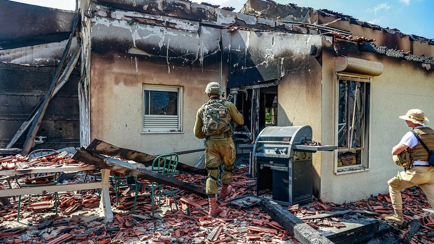 IDF soldiers at Be'eri after the Oct. 7 attacks