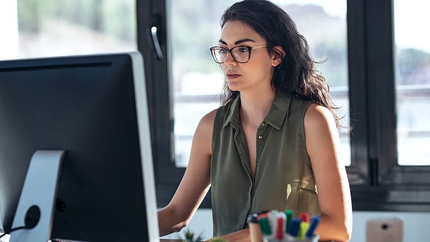 woman working on computer