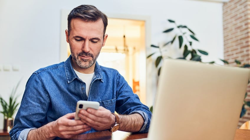 Man on phone at work