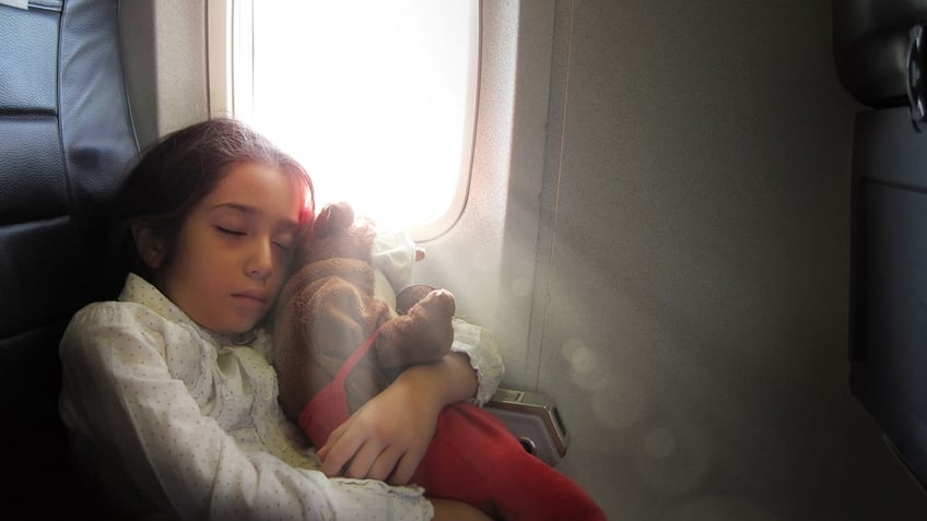 7 tips for falling asleep on long haul flights hint skip the alcohol coffee and sedatives