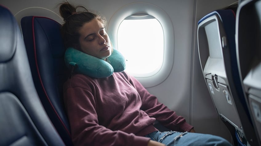 7 tips for falling asleep on long haul flights hint skip the alcohol coffee and sedatives