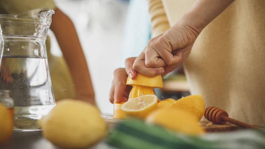 woman juicing lemons