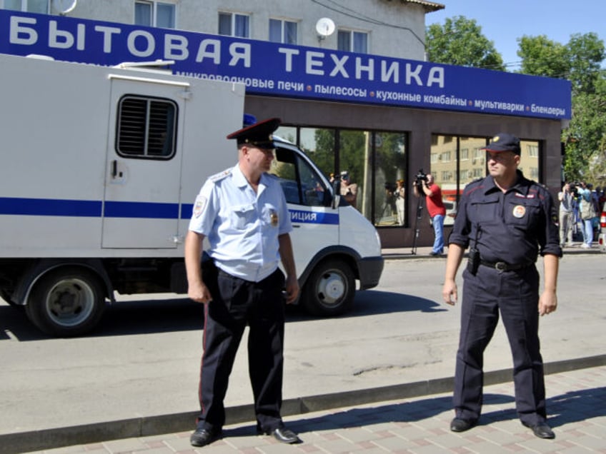 A Russian police vehicle carrying the 34-year-old Ukrainian airforce helicopter navigator