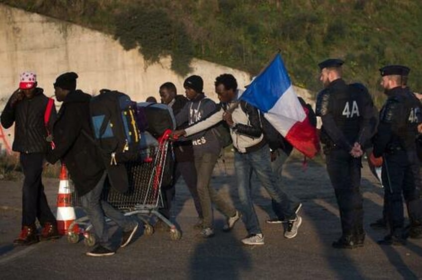 72 of french believe migrants pose security risk govt gives them too much aid