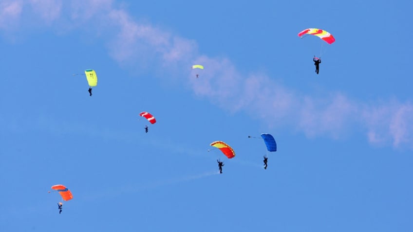 People skydiving