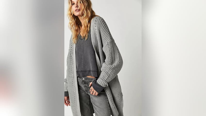 Wear an oversized cardigan for comfort.