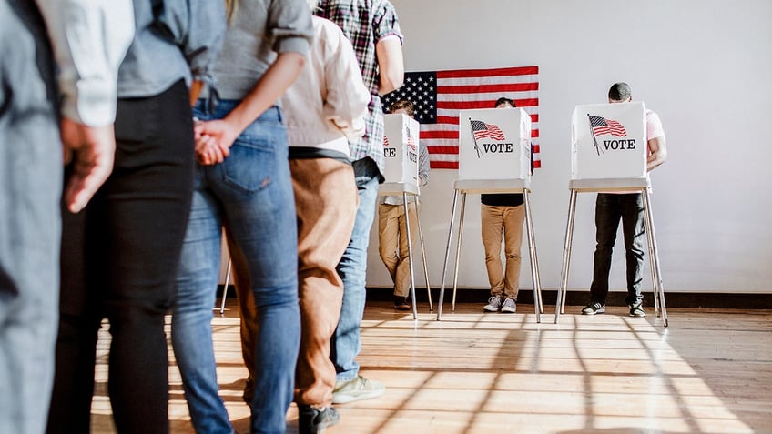 Americans at a polling booth.