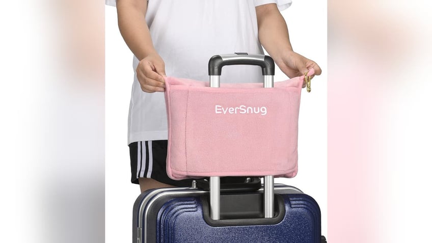 Get a travel blanket and pillow all in one. 