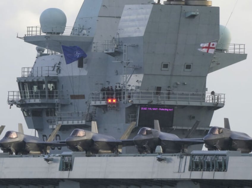 F35b jets line the deck of HMS Queen Elizabeth, as the Royal Navy aircraft carrier leaves Portsmouth Harbour. Picture date: Friday November 3, 2023. (Photo by Andrew Matthews/PA Images via Getty Images)