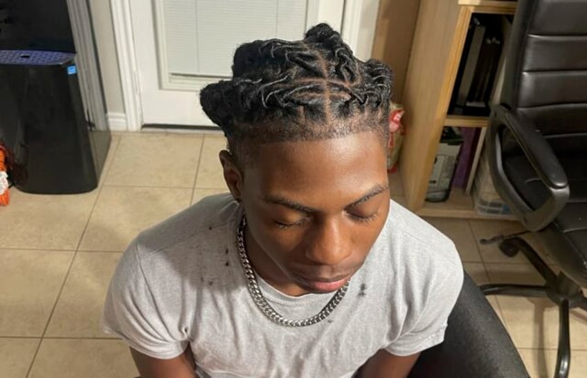 a black student was suspended for his hairstyle the school says it wasnt discrimination