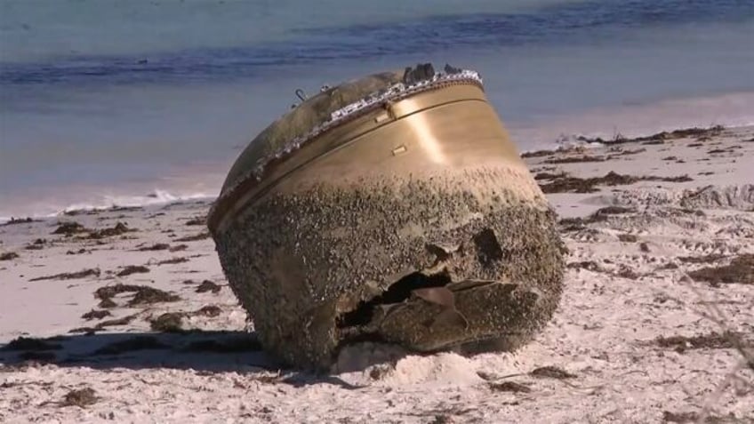 a car sized object that washed ashore in western australia is thought to be space junk