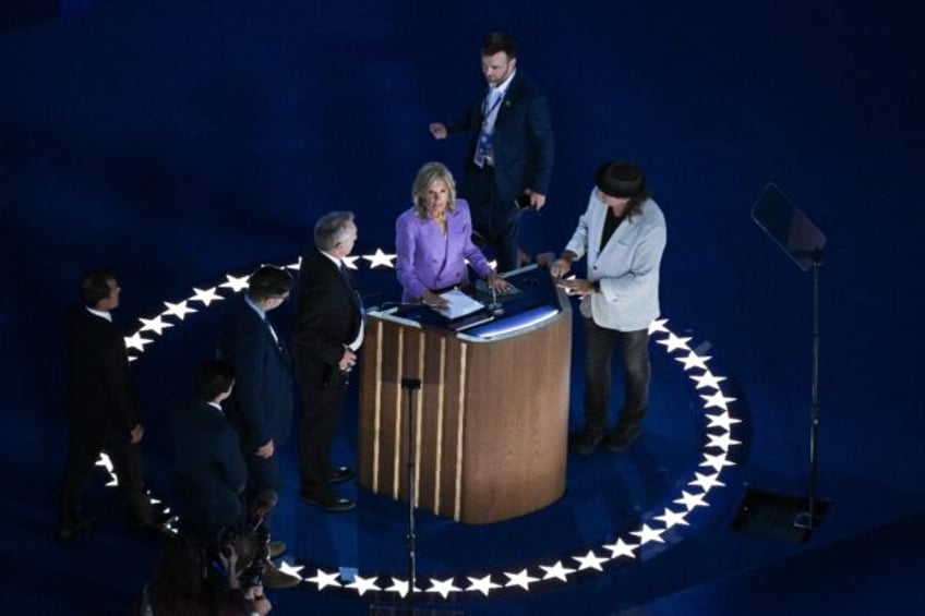 US First Lady Jill Biden does a stage check before the start of the Democratic National Co