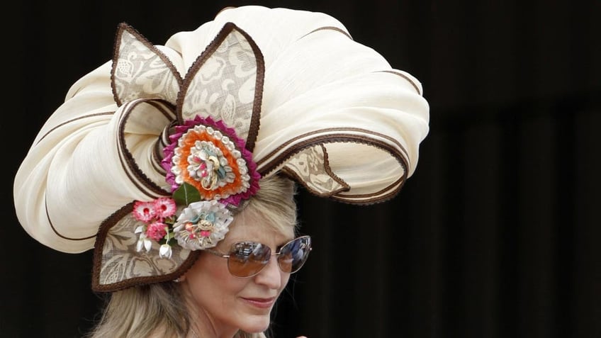 Cream-colored hat with floral embellishments