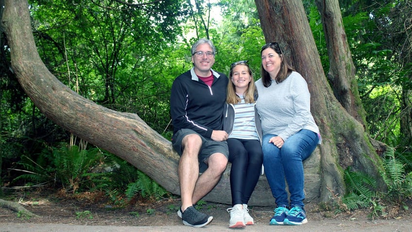 Barry Kluczyk poses with his family