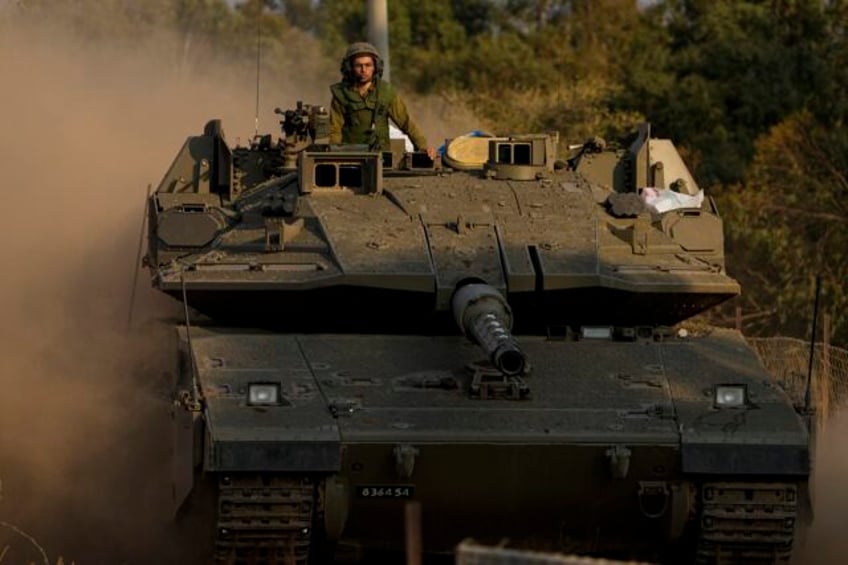 a possible israeli ground war looms in gaza what weapons are wielded by those involved