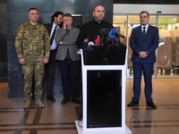 A Russian drone strike in northeastern Ukraine kills 9 people, officials say