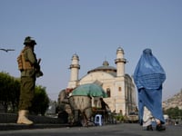 A top Taliban official offers amnesty to Afghans who fled the country and urges them to return