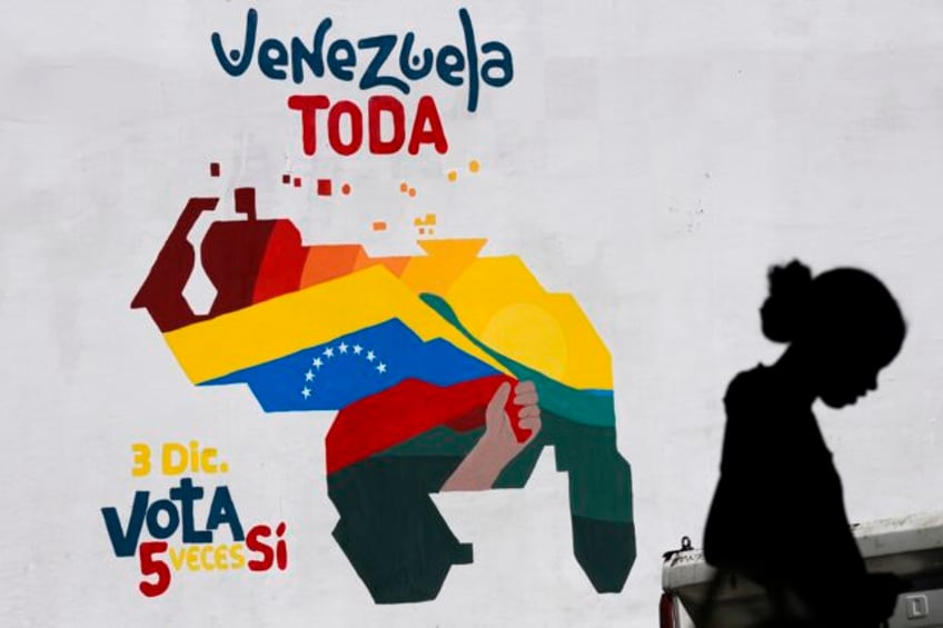 a un court is ruling on request to order venezuela to halt part of a referendum on a disputed region