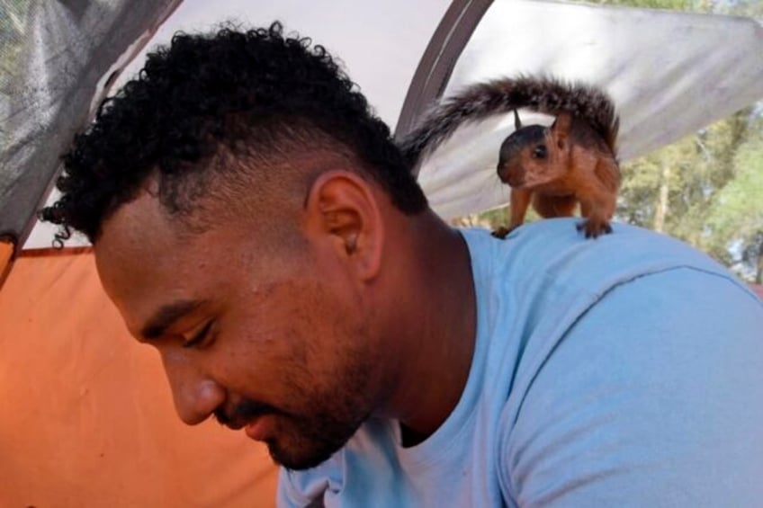 a venezuelan man and his pet squirrel made it to the us border now hes preparing to say goodbye