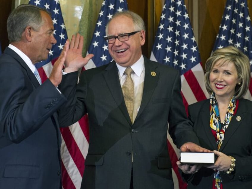 House Speaker John Boehner of Ohio administers a ceremonial re-enactment of the House oath