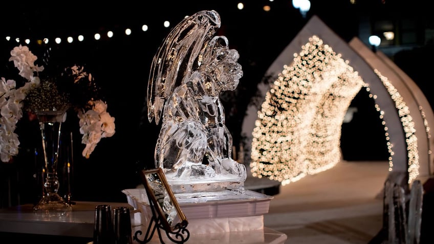 An ice sculpture and twinkling lights at Christine Quinn's wedding