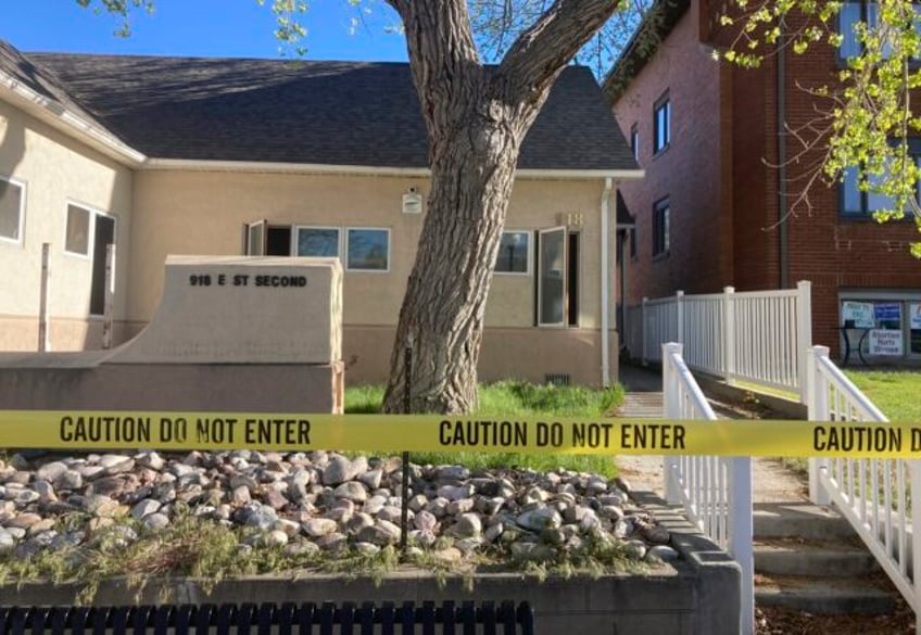 a woman pleads guilty to fire that kept a wyoming abortion clinic from opening for a year