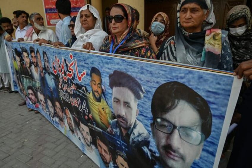 Families gather in Lalamusa town, Pakistan to mark the anniversary of one of the Mediterra