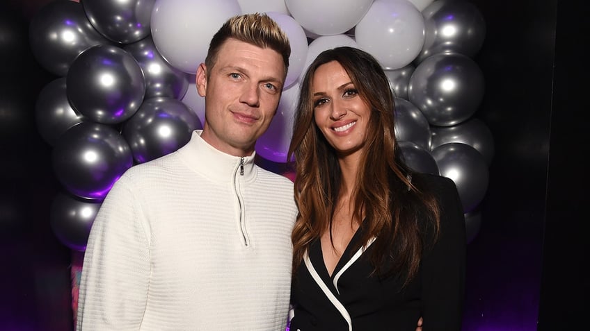 Nick Carter and Angel Carter Conrad posing together