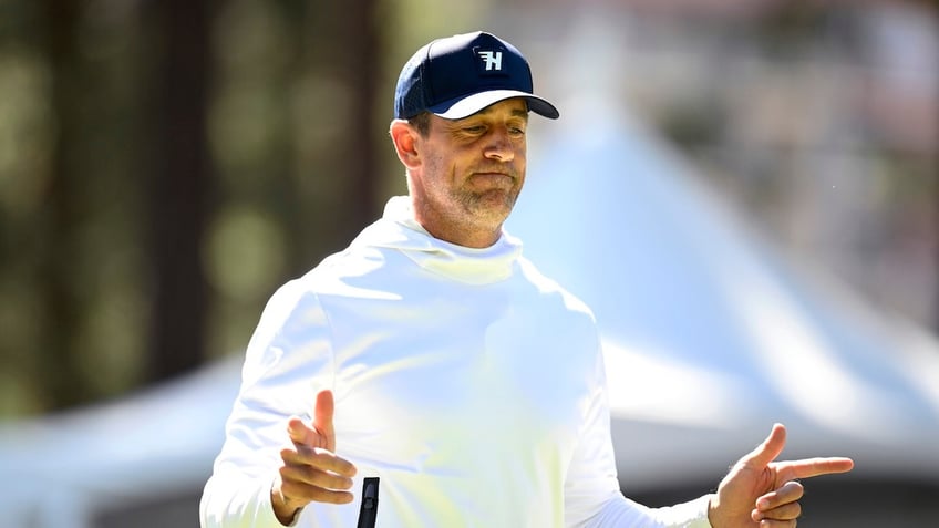 Aaron Rodgers at golf tournament