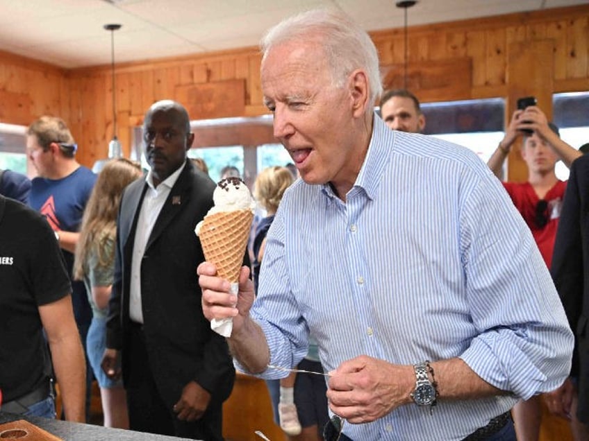 US President Joe Biden eats ice cream at Moomers Homemade Ice Cream in Traverse City, Michigan on July 3, 2021.