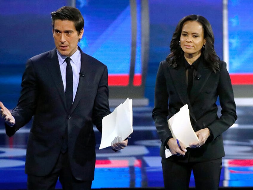 FILE - ABC World News Tonight Anchor David Muir, left, addresses members of the audience w