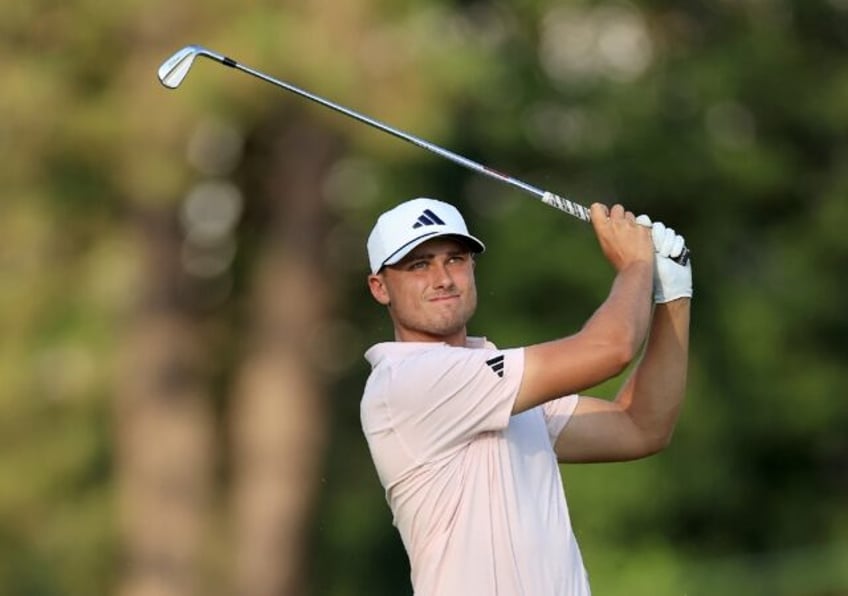 Sweden's Ludvig Aberg fired a one-under par 69 to grab a one-stroke lead after Friday's se