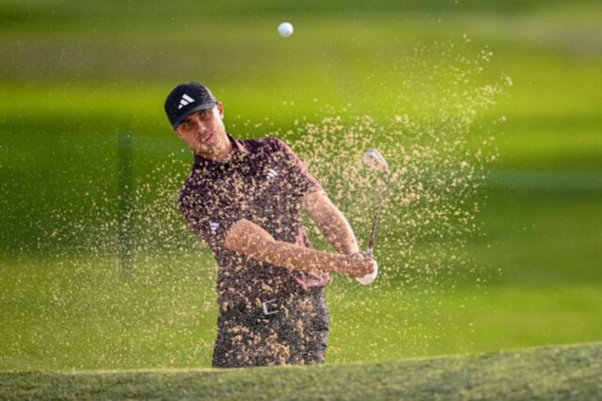 Ludvig Aberg blasts out of a bunker on his way to a nine-under-par 63 at the PGA Tour's Fa