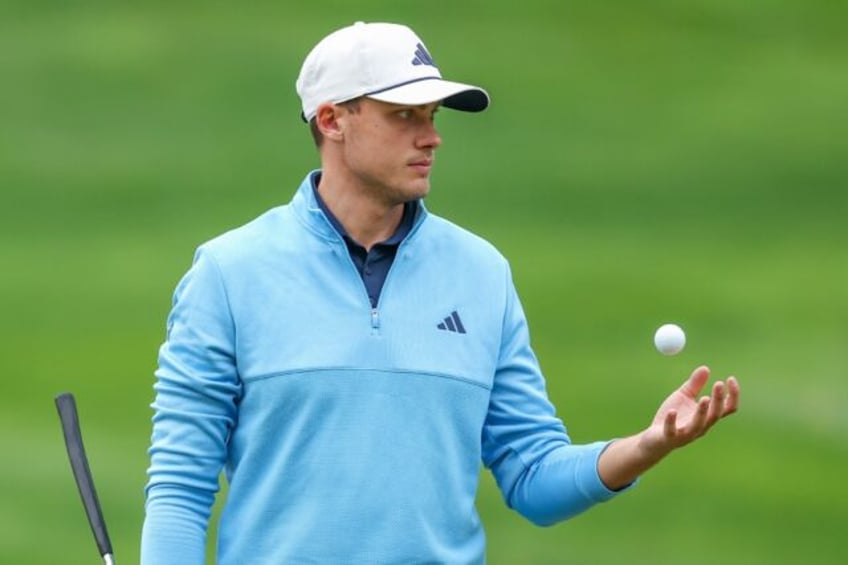 Sweden's Ludvig Aberg relaxes during a practice round on the eve of the start of the 106th