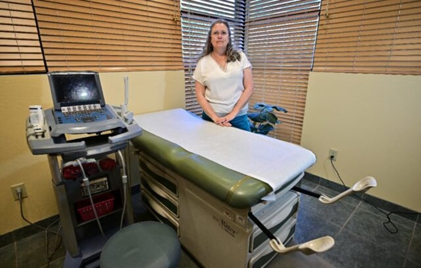 Gabrielle Goodrick, founder of Camelback Family Planning, poses at the clinic in Phoenix,