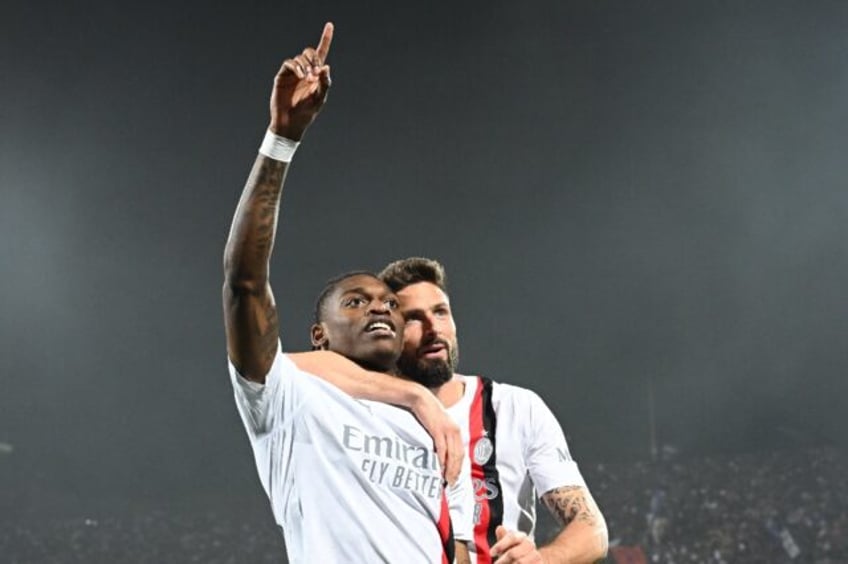 Rafael Leao (L) celebrates his fifth Serie A goal of the season