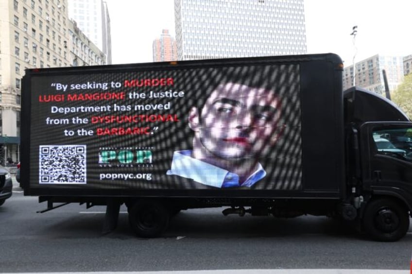 A truck with a video screen outside Manhattan Federal Court