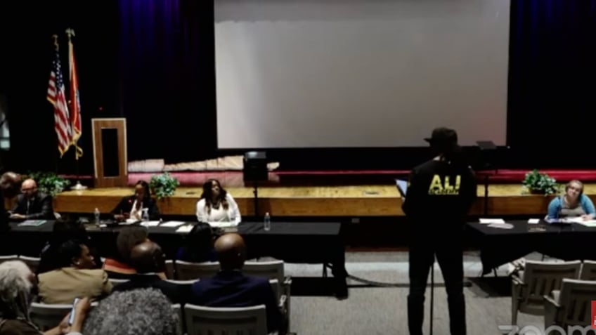 activist confronts st louis school board over poor black student outcomes require your criminal conviction