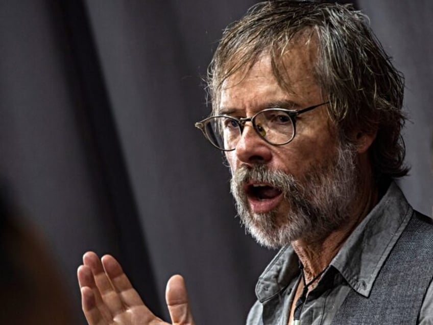 Guy Pearce talks to press as he attends the premiere of "The Convert" at the TIFF Bell Lig