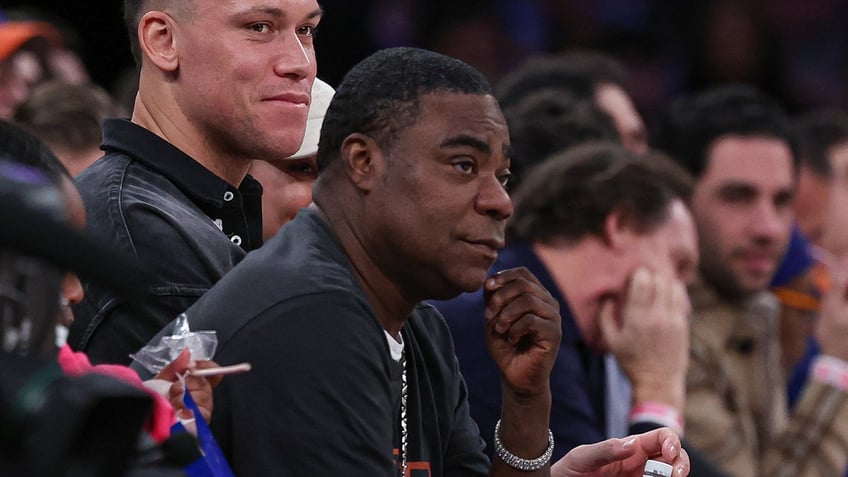 Tracy Morgan sits courtside