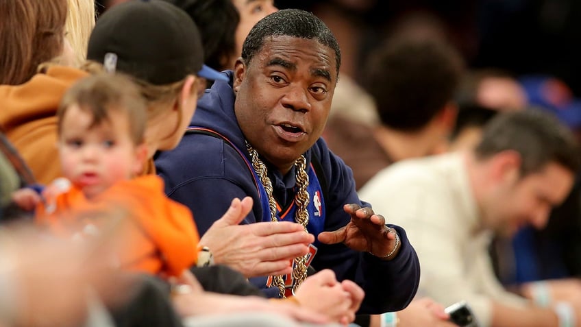 Tracy Morgan sits courtside